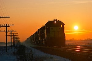 train on track at sunset