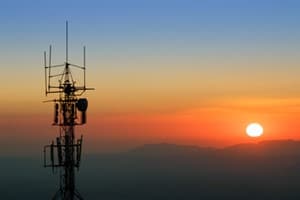 photo of cell tower at sunset
