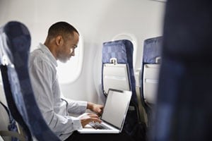 man on plane working