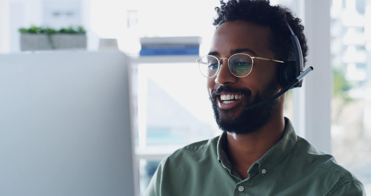 man talking on headphones customer support