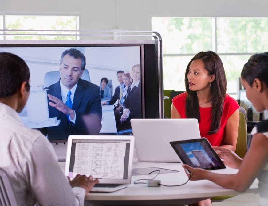 business meeting sharing screens and video conference