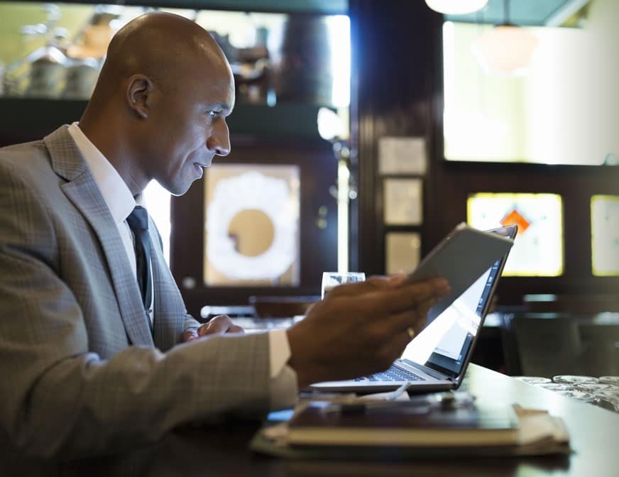 business man looking at work tablet