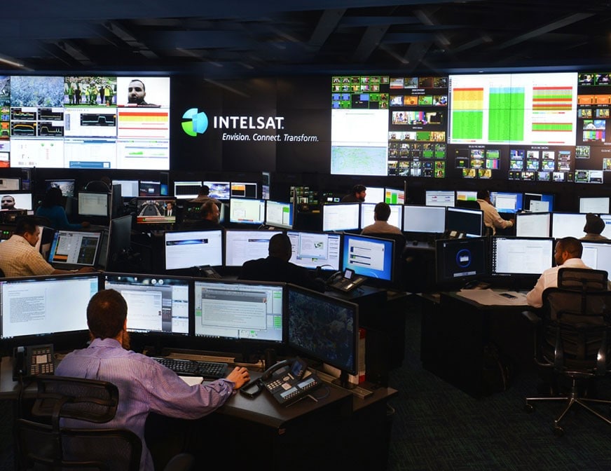 intelsat staff monitoring teleports, satlelite, and traffic in the noc