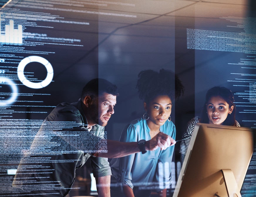 photo of people working on computer screens with connections through the cloud