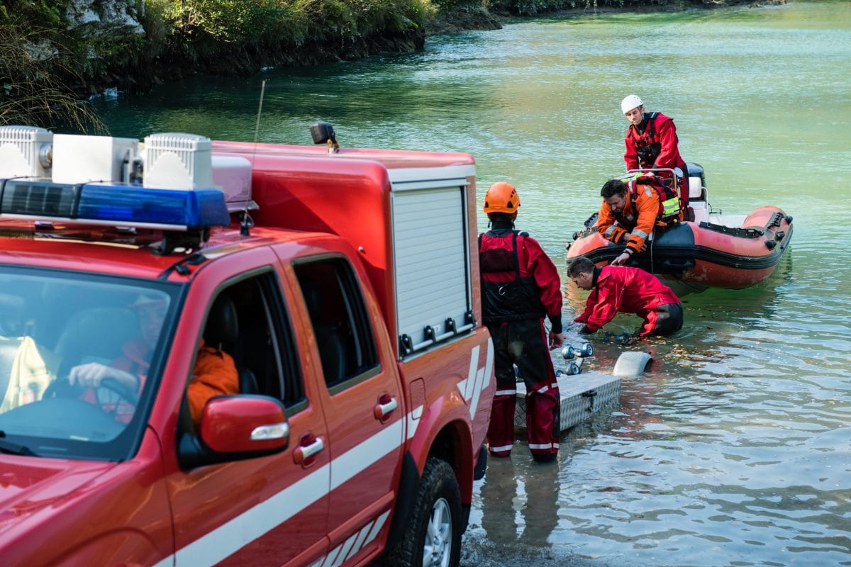 Emergency team deploying raft