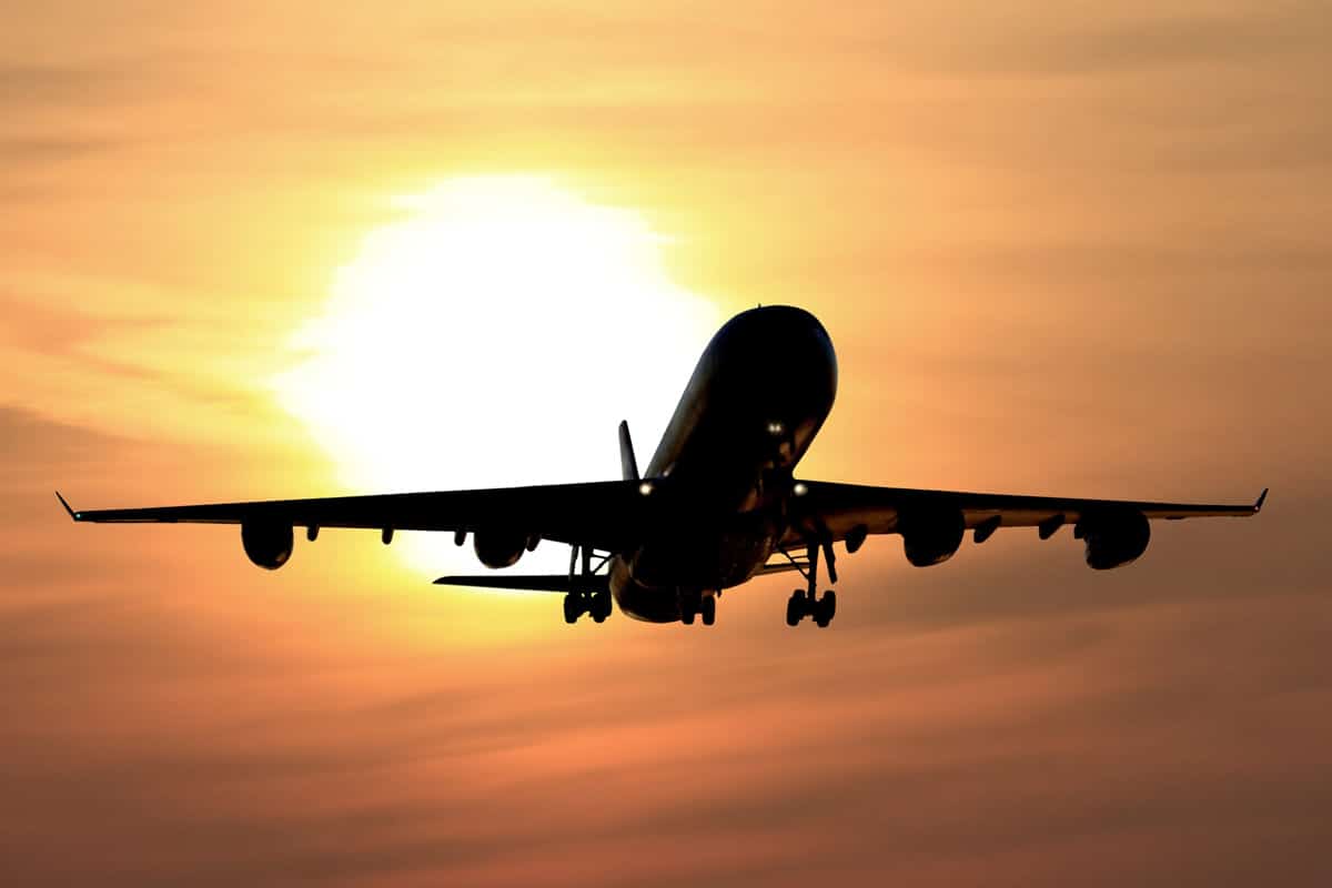 Airplane Sunrise shutterstock 61018294