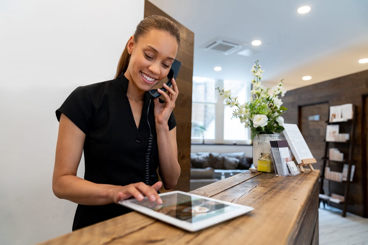 Woman Tablet Business 1055920172 1