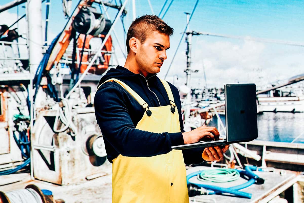 fisherman with laptop