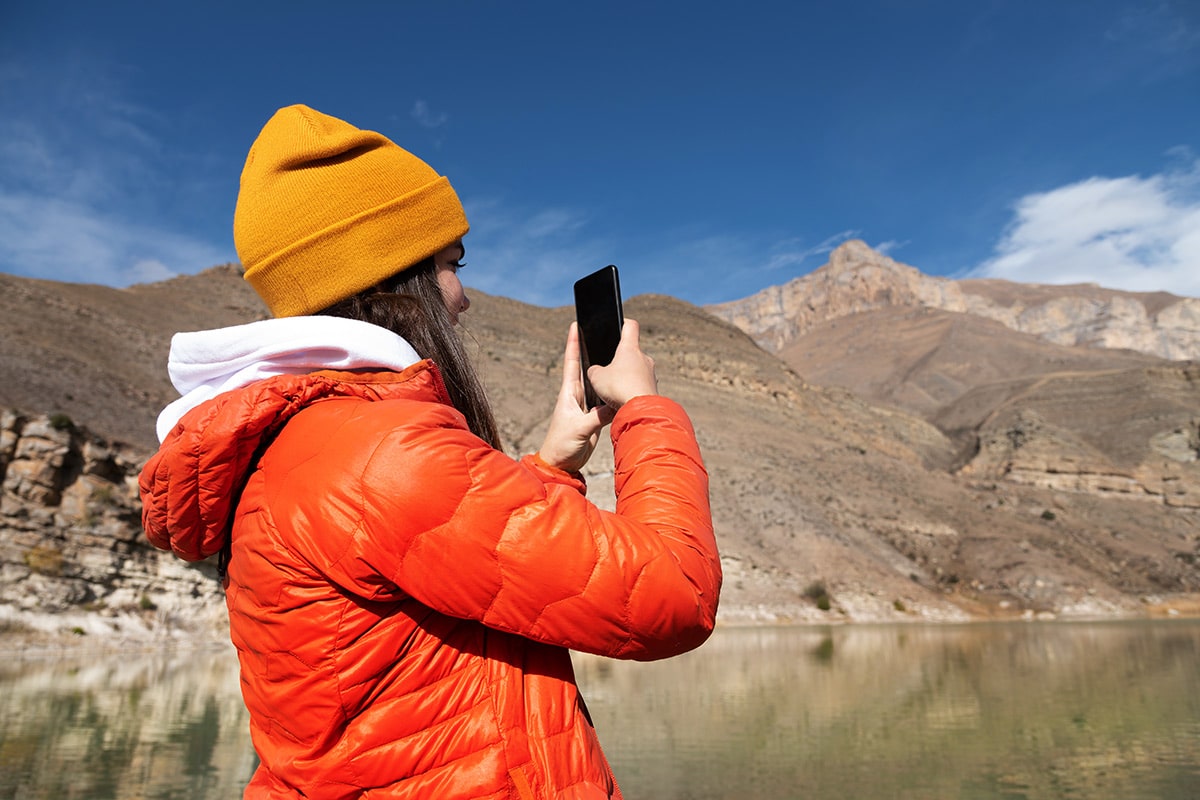 woman on phone in nature