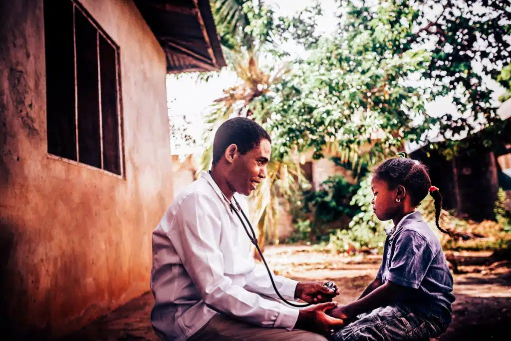 Doctor talking to child