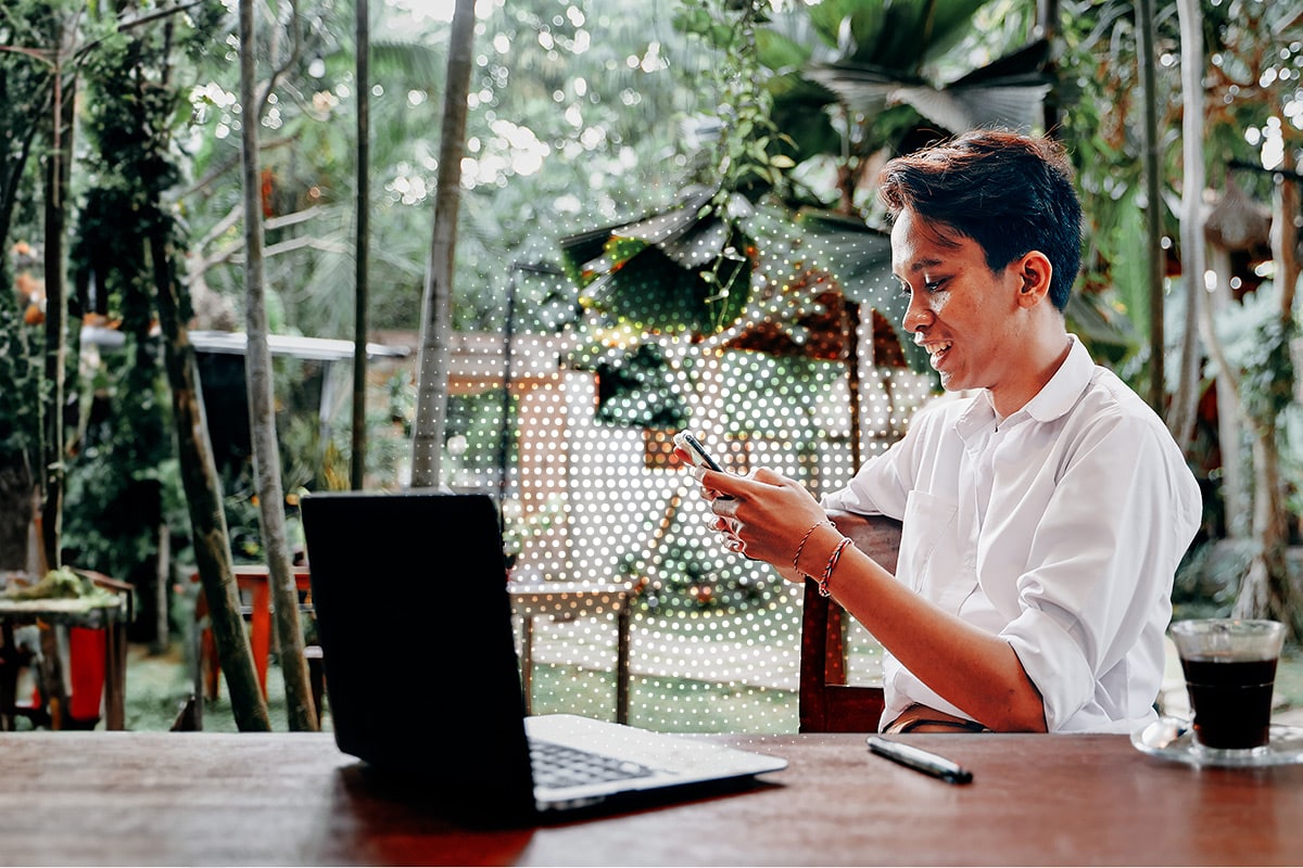 man using devices in Indonesia