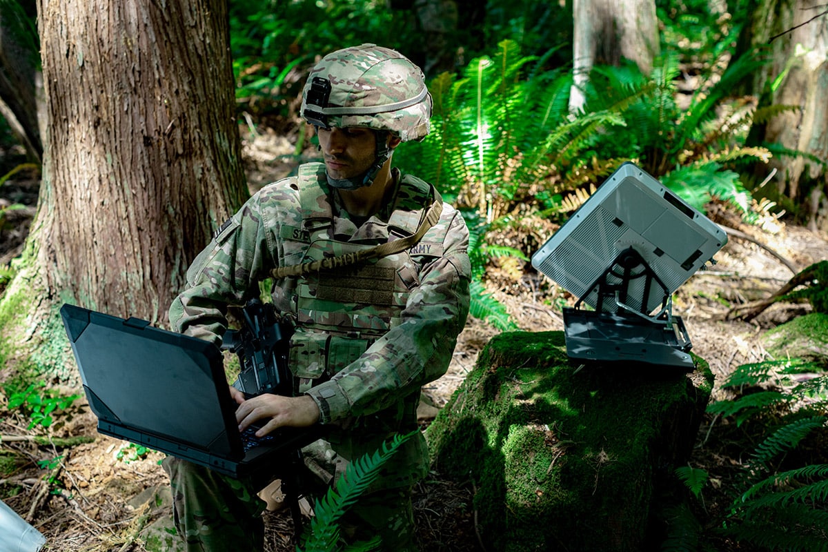 soldier using LEO satellite phone