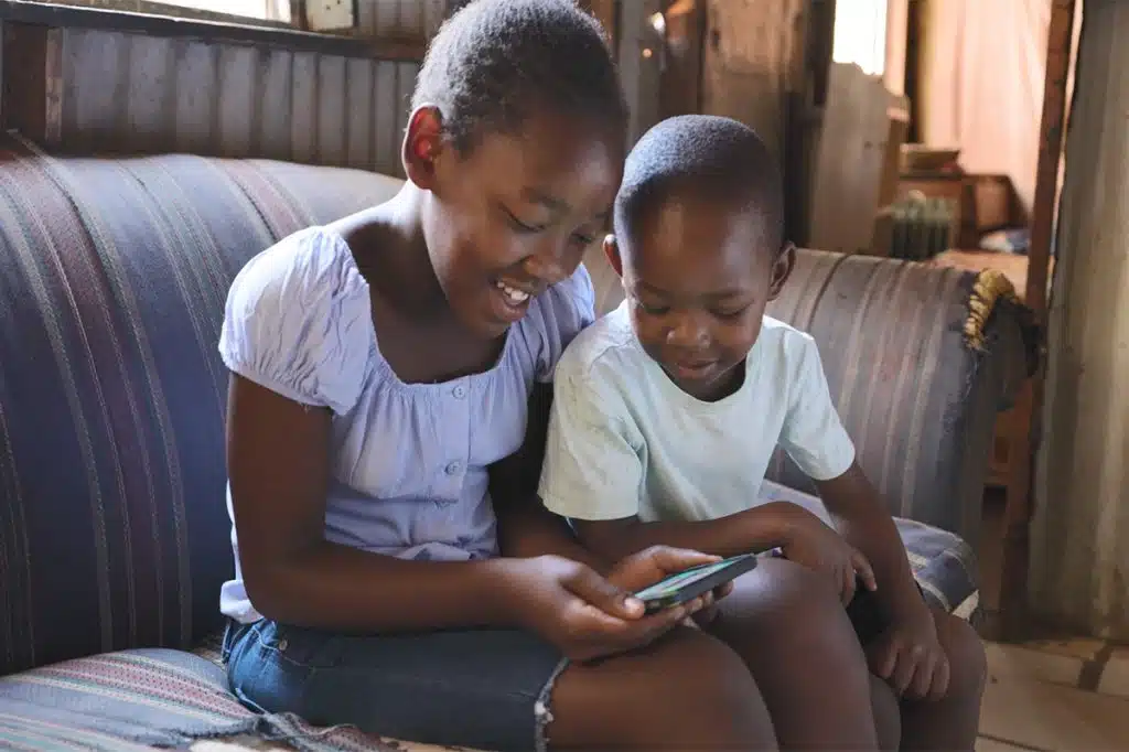 children using mobile internet in West Africa