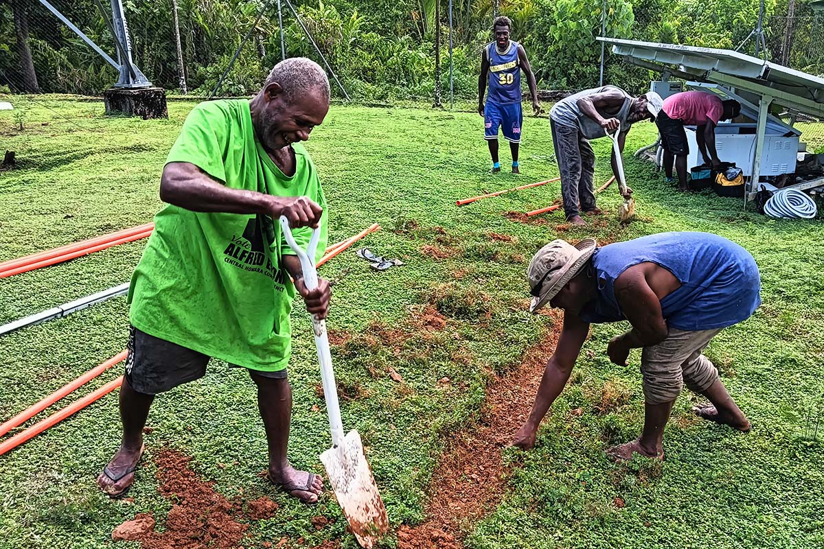 Workers in the Solomon Islands improving satellite connectivity