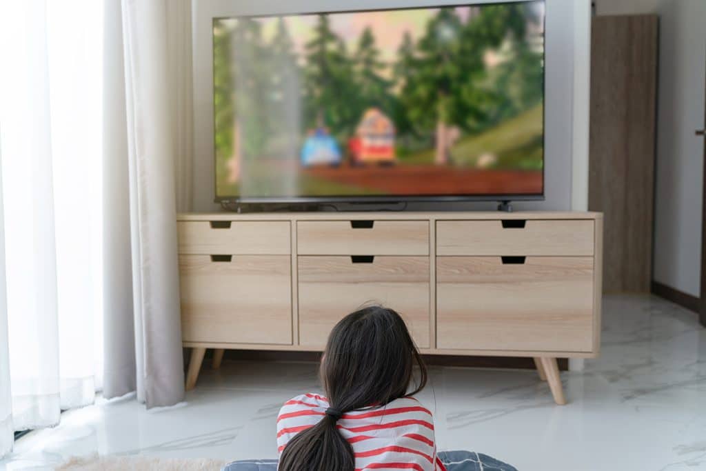 Girl watching Faith Beyond TV